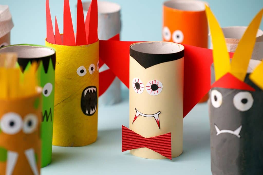 a range of Halloween monsters made from toilet paper tubes