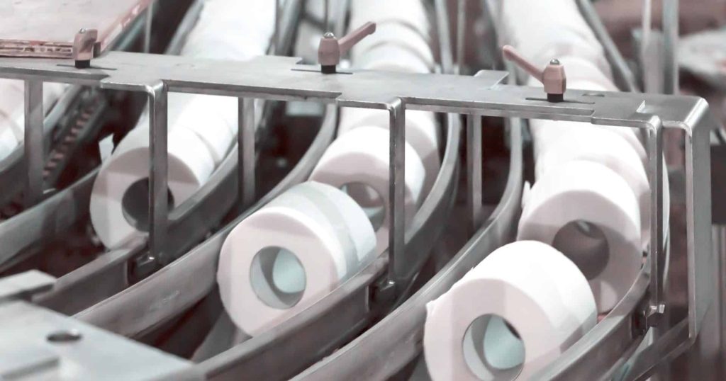 toilet paper being made in a factory